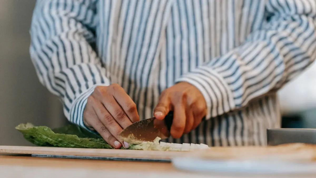 Dog owner preparing a meal