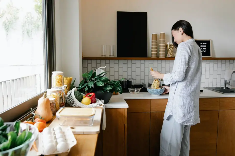 Dog owner preparing a meal